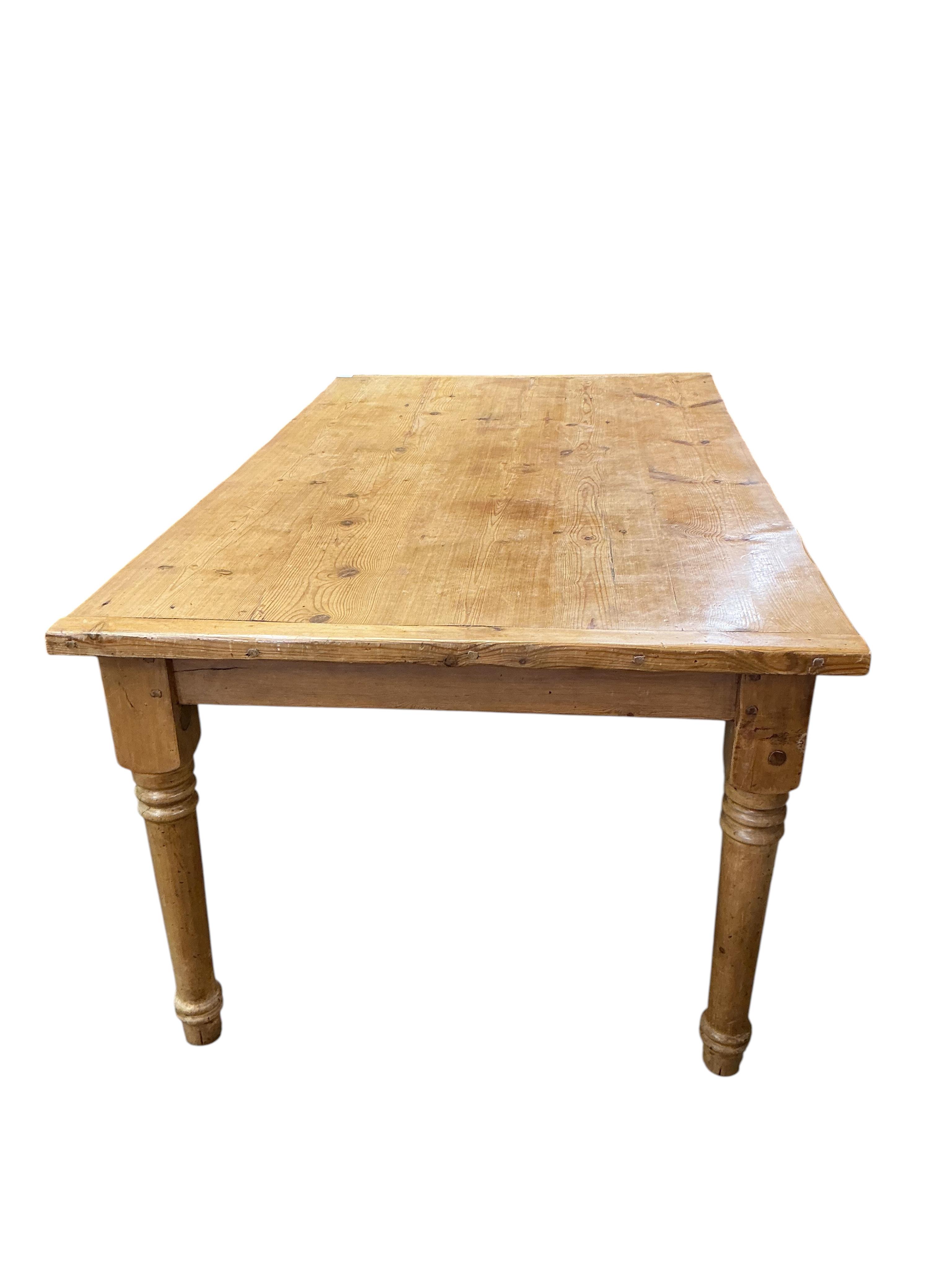 A Victorian style rectangular pine kitchen table, width 182cm, depth 102cm, height 77cm